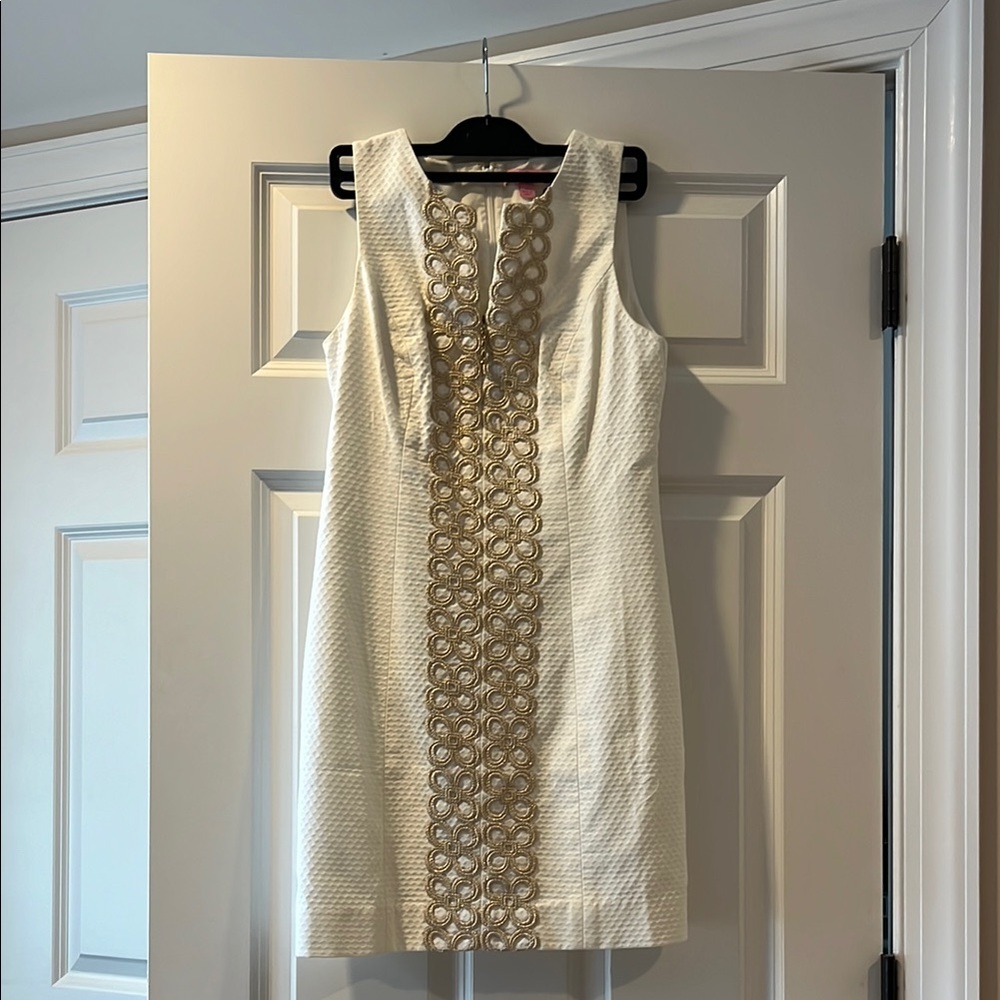 Elegant White and Gold Sleeveless Dress